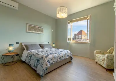 Letto o letti in una camera di Casa di Paola - terrace with view in Florence
