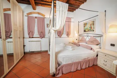 Letto o letti in una camera di Aleri