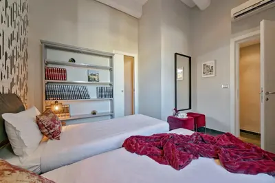Letto o letti in una camera di Apartments Florence - Duomo