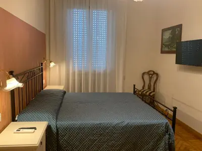 Letto o letti in una camera di Donatello Apartment