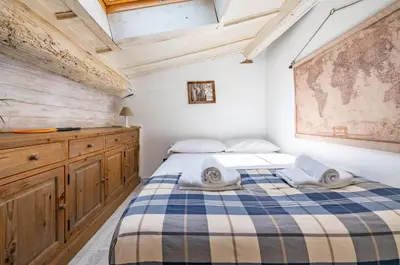 Letto o letti in una camera di GuestHost - Gioberti Cozy Apartment con Terrazzo