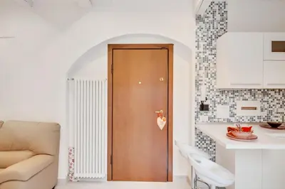 Area soggiorno di GuestHost - Coverciano Modern Apartment with Patio!