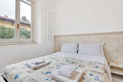 Letto o letti in una camera di GuestHost - Coverciano Modern Apartment with Patio!