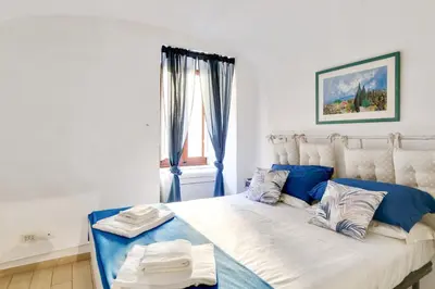 Letto o letti in una camera di GuestHost - Parioncino Central and Cozy Apartment
