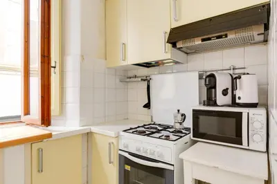 Cucina o angolo cottura di GuestHost - Parioncino Central and Cozy Apartment