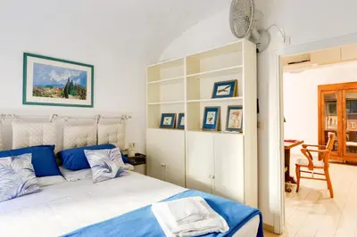 Letto o letti in una camera di GuestHost - Parioncino Central and Cozy Apartment