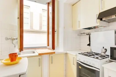 Cucina o angolo cottura di GuestHost - Parioncino Central and Cozy Apartment