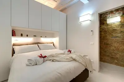 Letto o letti in una camera di Brancacci Suite by Mamo Florence