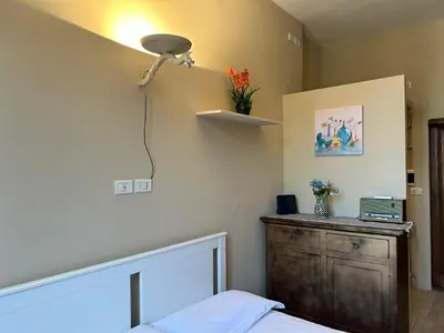 Letto o letti in una camera di Appartamento Firenze Mayer