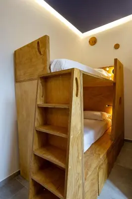 Letto o letti in una camera di Hotel Paola