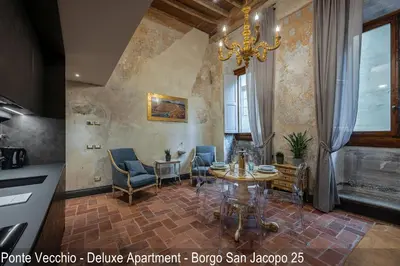 Area soggiorno di Soggiorni D'Arte Apartments by Mamo Florence