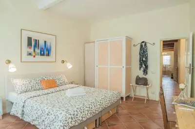 Letto o letti in una camera di Cozy Macci flat 4 people near Santa Croce Square
