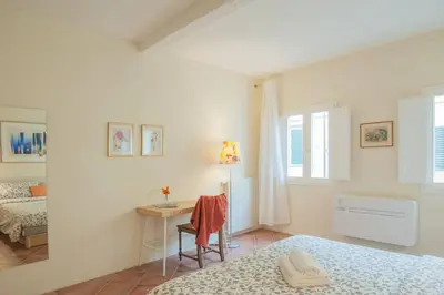 Letto o letti in una camera di Cozy Macci flat 4 people near Santa Croce Square