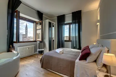 Letto o letti in una camera di Sleep Tight Florence Suite