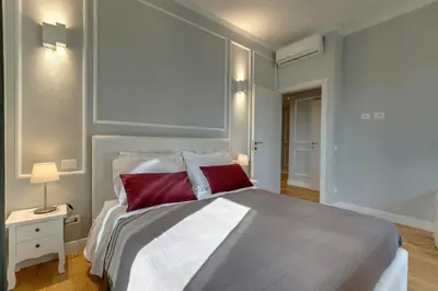 Letto o letti in una camera di Sleep Tight Florence Suite