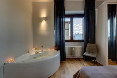 Letto o letti in una camera di Sleep Tight Florence Suite