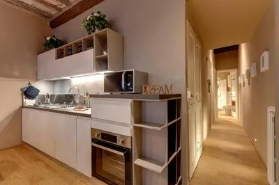 Cucina o angolo cottura di Santa Croce Loft by Mamo Florence