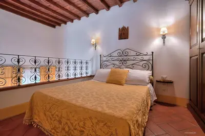 Letto o letti in una camera di First of Florence