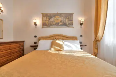 Letto o letti in una camera di First of Florence