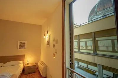 Letto o letti in una camera di Darling Apartment With Stunning Views On Duomo