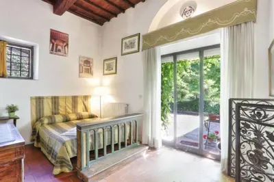 Letto o letti in una camera di VIlla Merlo Ner0