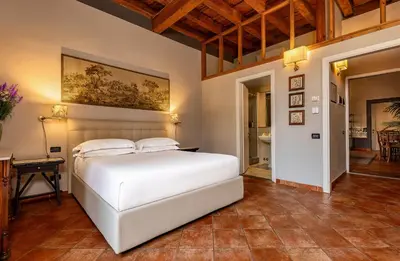 Letto o letti in una camera di Antica Dimora De' Benci