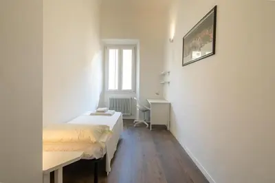 Letto o letti in una camera di Indipendenza House by Mmega