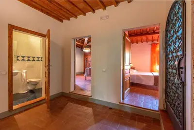 Letto o letti in una camera di Casale del Lago