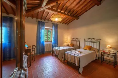Letto o letti in una camera di Casale del Lago