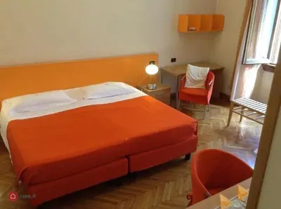 Letto o letti in una camera di Affittacamere ACCASA
