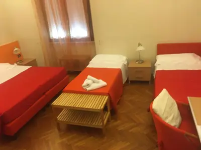 Letto o letti in una camera di Affittacamere ACCASA