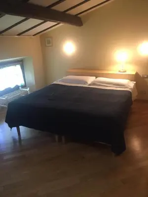 Letto o letti in una camera di Affittacamere ACCASA