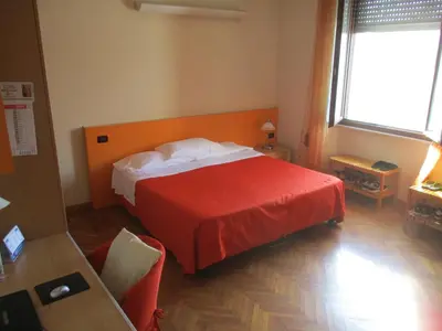 Letto o letti in una camera di Affittacamere ACCASA