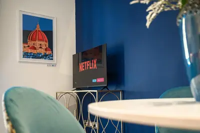 TV o dispositivi per l'intrattenimento presso Via Macci, 59 - Florence Charming Apartments - Stylish apartments in a vibrant neighborhood with so comfortable beds!