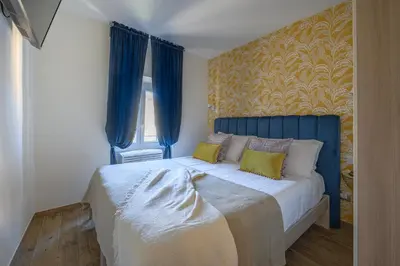Letto o letti in una camera di Via Macci, 59 - Florence Charming Apartments - Stylish apartments in a vibrant neighborhood with so comfortable beds!