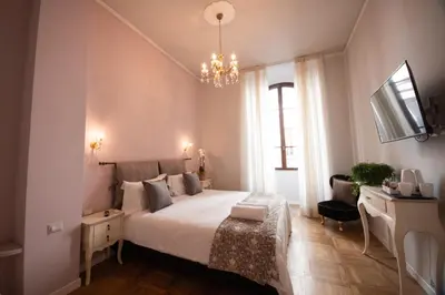Letto o letti in una camera di B&B Dimora Sassetti 6