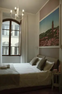 Letto o letti in una camera di B&B Dimora Sassetti 6