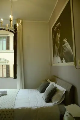 Letto o letti in una camera di B&B Dimora Sassetti 6