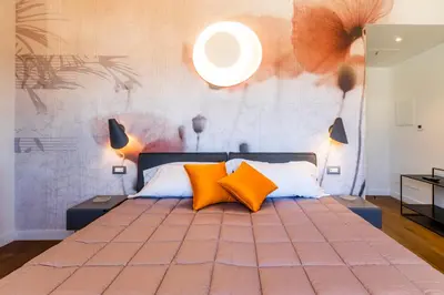 Letto o letti in una camera di Residenza Benizzi - Boutique Guest House in the Historic Center of Florence