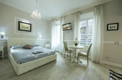 Letto o letti in una camera di Leoni by Monteverdi Apartments