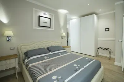 Letto o letti in una camera di Leoni by Monteverdi Apartments