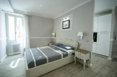 Letto o letti in una camera di Leoni by Monteverdi Apartments