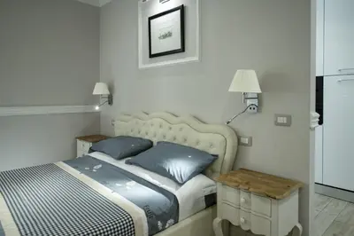 Letto o letti in una camera di Leoni by Monteverdi Apartments