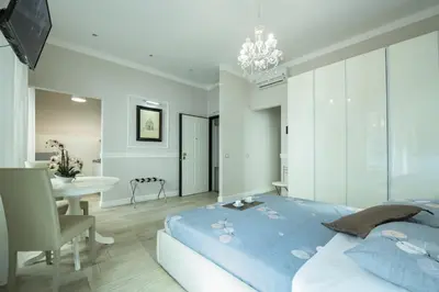 Letto o letti in una camera di Leoni by Monteverdi Apartments