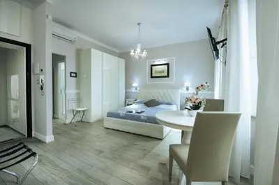Letto o letti in una camera di Leoni by Monteverdi Apartments
