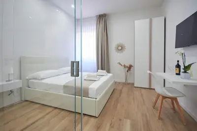 Letto o letti in una camera di Sweet Florence