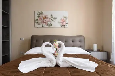 Letto o letti in una camera di Pinzochere Suite