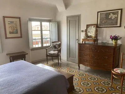 Letto o letti in una camera di ATTICO IN PIAZZA SANTA CROCE