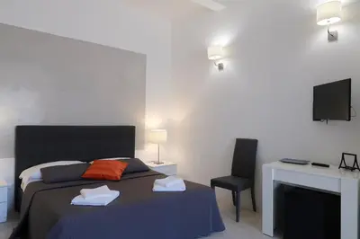 Letto o letti in una camera di Locanda Della Musica