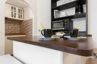 Cucina o angolo cottura di GuestHost - Pergola Modern and Cozy Studio